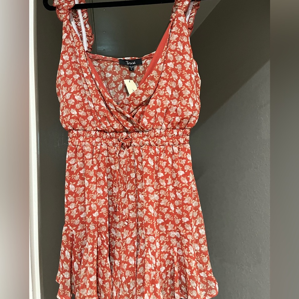 NWT Terracotta floral romper from Francesca’s